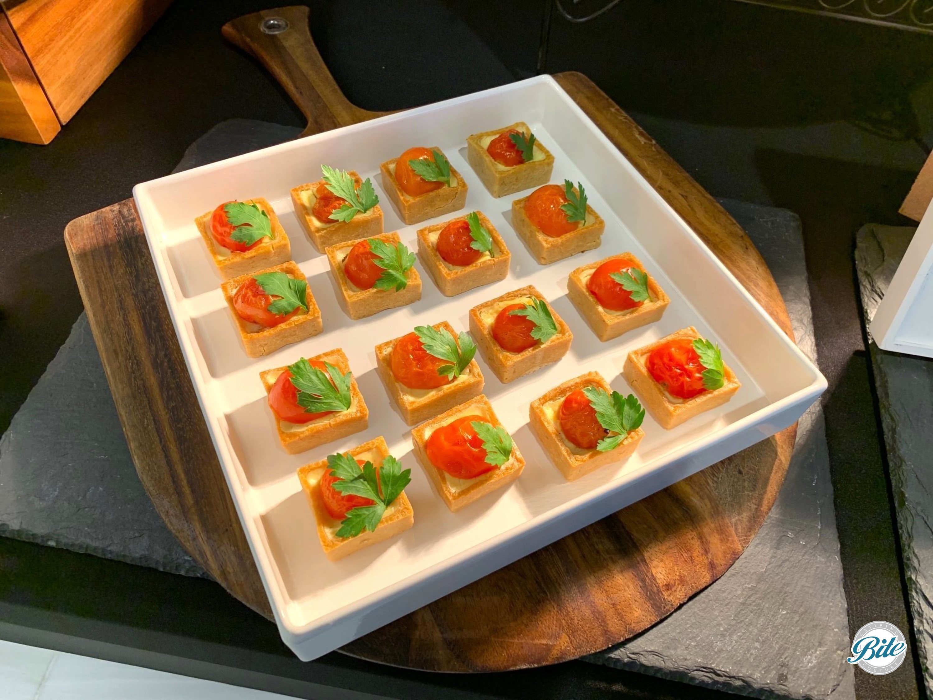 Tomato and Herb Tarts in White Bowl