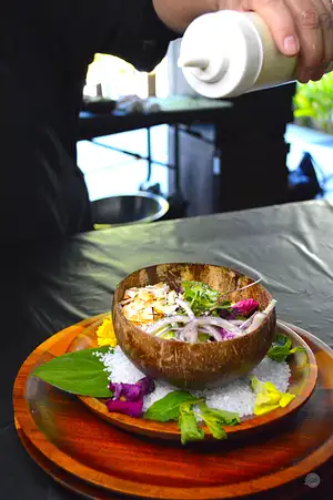 Cucumber and Coconut Salad served in a halved coconut