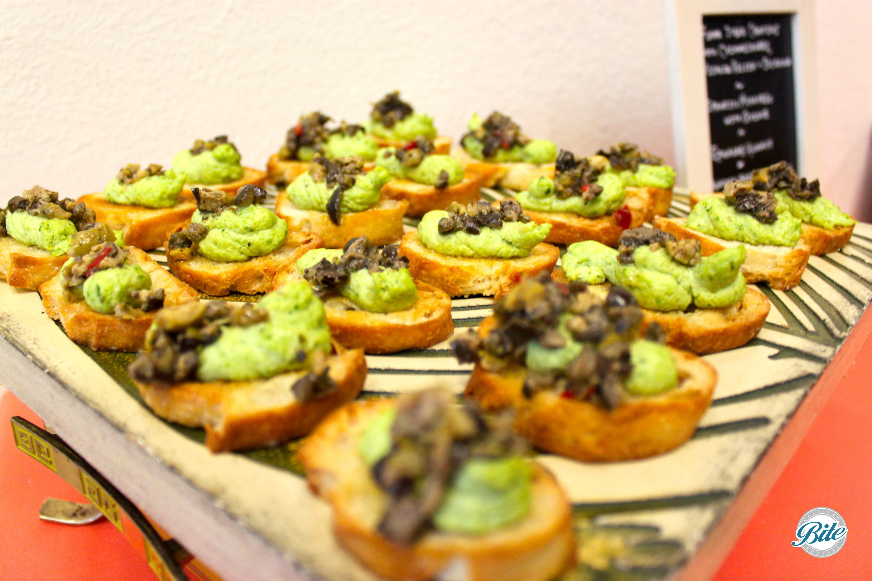 Edamame Hummus with Tapenade Crostini for Funeral Menu at Torrance Cultural Arts Center